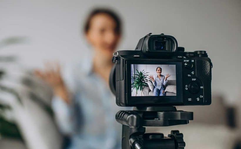 video camera filming a person